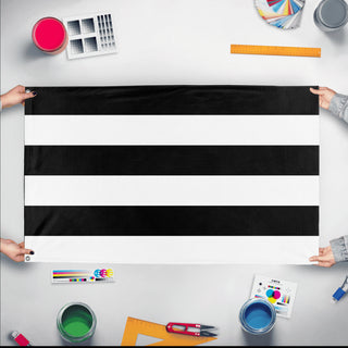 A mockup of the custom flag 'Heterosexual Flag' held up on a table during print checking