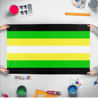 A mockup of the custom flag 'Metagender Flag' held up on a table during print checking