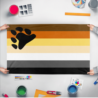 A mockup of the custom flag 'Bear Brotherhood flag' held up on a table during print checking