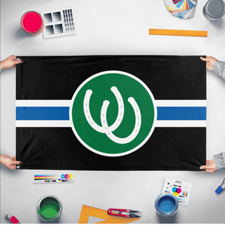 A mockup of the custom flag 'Pony Flag' held up on a table during print checking