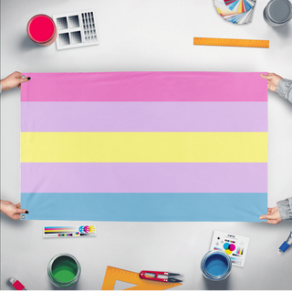 A mockup of the custom flag 'Apogender Flag' held up on a table during print checking