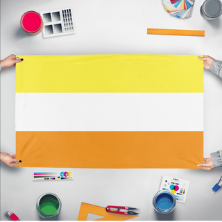 A mockup of the custom flag 'Maverique Pride Flag' held up on a table during print checking