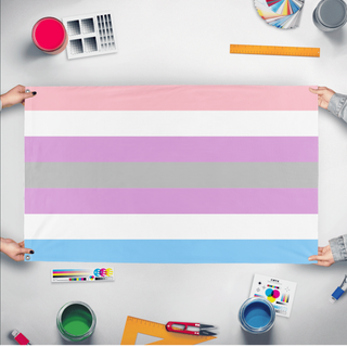 A mockup of the custom flag 'Intergender Flag' held up on a table during print checking