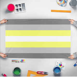 A mockup of the custom flag 'Demigender/Deminonbinary Flag' held up on a table during print checking