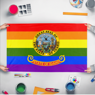 A mockup of the custom flag 'Idaho Pride Flag' held up on a table during print checking