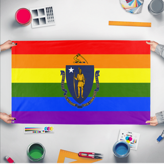 A mockup of the custom flag 'Massachusetts Pride Flag' held up on a table during print checking