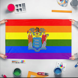 A mockup of the custom flag 'New Jersey Pride Flag' held up on a table during print checking