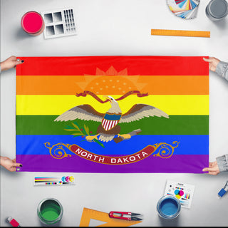 A mockup of the custom flag 'North Dakota Pride Flag' held up on a table during print checking