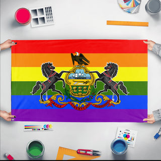 A mockup of the custom flag 'Pennsylvania Pride Flag' held up on a table during print checking