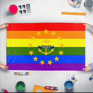 A mockup of the custom flag 'Rhode Island Pride Flag' held up on a table during print checking