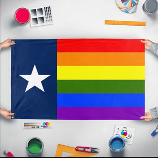 A mockup of the custom flag 'Texas Pride Flag' held up on a table during print checking