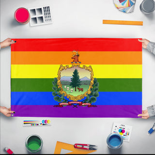 A mockup of the custom flag 'Vermont Pride Flag' held up on a table during print checking