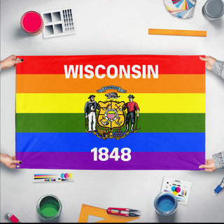 A mockup of the custom flag 'Wisconsin Pride Flag' held up on a table during print checking