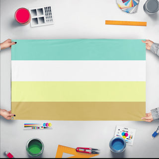A mockup of the custom flag 'OCD Pride Flag' held up on a table during print checking