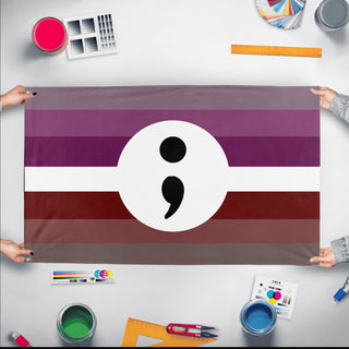 A mockup of the custom flag 'Dysthymia Pride Flag' held up on a table during print checking