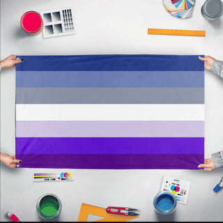 A mockup of the custom flag 'masc lesbian flag' held up on a table during print checking