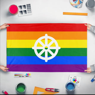 A mockup of the custom flag 'Buddhist Pride Flag' held up on a table during print checking