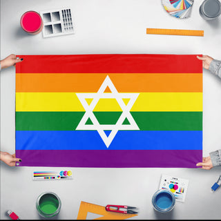 A mockup of the custom flag 'Jewish Pride Flag' held up on a table during print checking