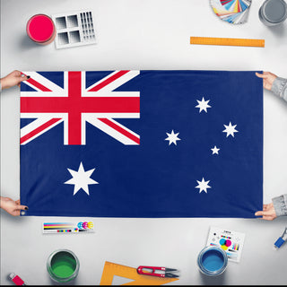 A mockup of the custom flag 'Flag of Australia flag' held up on a table during print checking