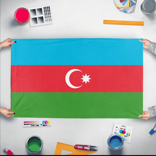 A mockup of the custom flag 'Flag of Azerbaijan flag' held up on a table during print checking