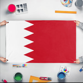 A mockup of the custom flag 'Flag of Bahrain flag' held up on a table during print checking