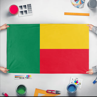 A mockup of the custom flag 'Flag of Benin flag' held up on a table during print checking