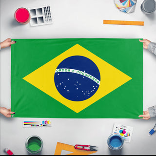 A mockup of the custom flag 'Flag of Brazil flag' held up on a table during print checking
