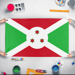 A mockup of the custom flag 'Flag of Burundi flag' held up on a table during print checking