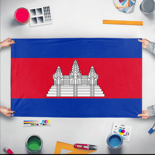 A mockup of the custom flag 'Flag of Cambodia flag' held up on a table during print checking