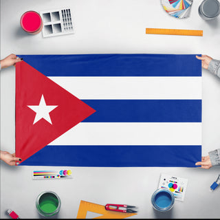 A mockup of the custom flag 'Flag of Cuba flag' held up on a table during print checking