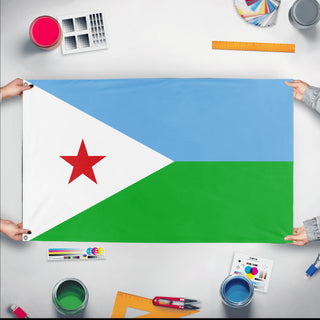 A mockup of the custom flag 'Flag of Djibouti flag' held up on a table during print checking