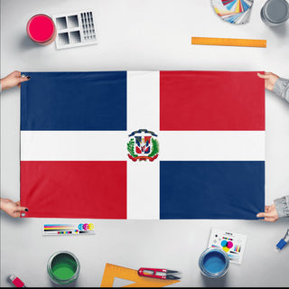 A mockup of the custom flag 'Flag of Dominican Republic flag' held up on a table during print checking