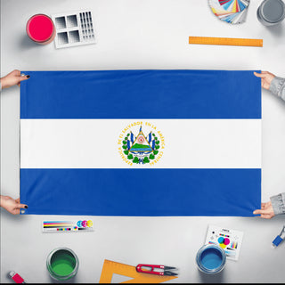 A mockup of the custom flag 'Flag of El Salvador flag' held up on a table during print checking