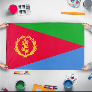 A mockup of the custom flag 'Flag of Eritrea flag' held up on a table during print checking