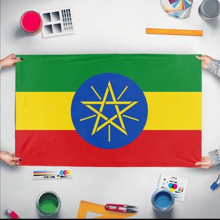 A mockup of the custom flag 'Flag of Ethiopia flag' held up on a table during print checking