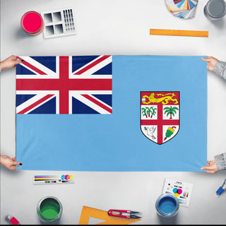 A mockup of the custom flag 'Flag of Fiji flag' held up on a table during print checking