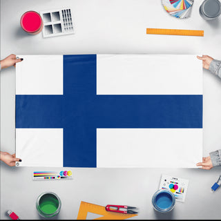 A mockup of the custom flag 'Flag of Finland flag' held up on a table during print checking
