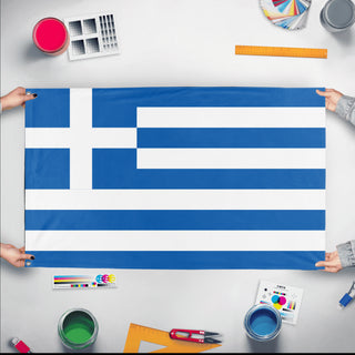A mockup of the custom flag 'Flag of Greece flag' held up on a table during print checking