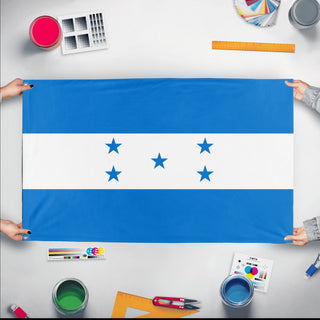 A mockup of the custom flag 'Flag of Honduras flag' held up on a table during print checking
