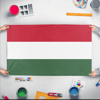 A mockup of the custom flag 'Flag of Hungary flag' held up on a table during print checking