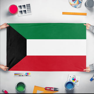 A mockup of the custom flag 'Flag of Kuwait flag' held up on a table during print checking