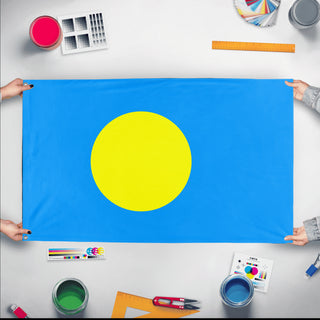 A mockup of the custom flag 'Flag of Palau flag' held up on a table during print checking