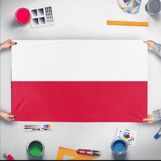A mockup of the custom flag 'Flag of Poland flag' held up on a table during print checking