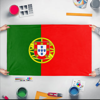A mockup of the custom flag 'Flag of Portugal flag' held up on a table during print checking