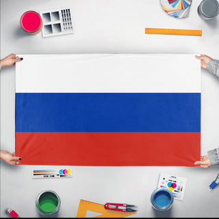 A mockup of the custom flag 'Flag of Russia flag' held up on a table during print checking
