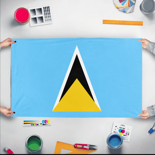 A mockup of the custom flag 'Flag of Saint Lucia flag' held up on a table during print checking