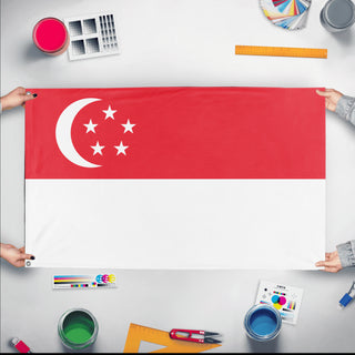 A mockup of the custom flag 'Flag of Singapore flag' held up on a table during print checking