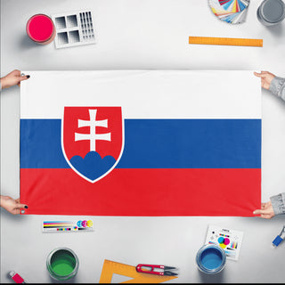 A mockup of the custom flag 'Flag of Slovakia flag' held up on a table during print checking