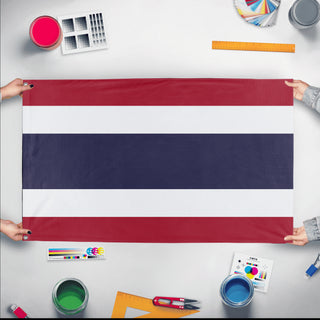 A mockup of the custom flag 'Flag of Thailand flag' held up on a table during print checking