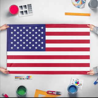 A mockup of the custom flag 'Flag of United States of America flag' held up on a table during print checking